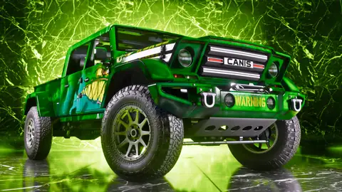 a green lifted Canis off road truck with WARNING lettering on its front bumper in a Rockstar Games image for GTA 6