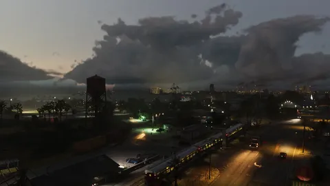storm clouds over a Leonida town at dusk with a water tower and rail line in an official GTA 6 screenshot