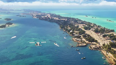 an aerial view of a Leonida island chain with boats and a white seaplane over turquoise water in a Rockstar Games image for GTA 6