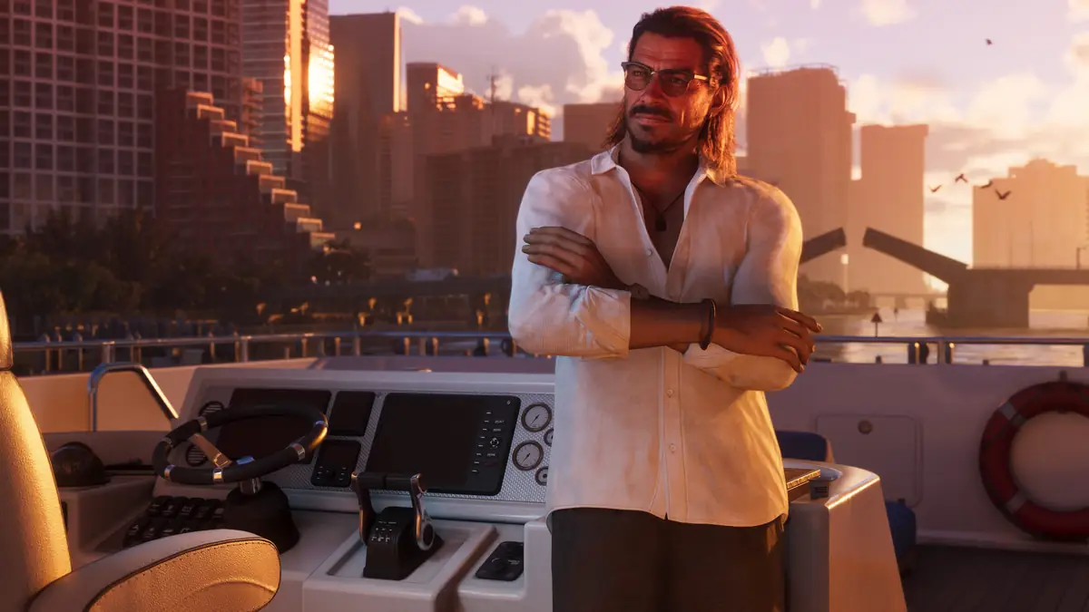 Raul Bautista standing with his arms crossed on a boat deck in front of the Vice City skyline in a Rockstar Games image for GTA 6