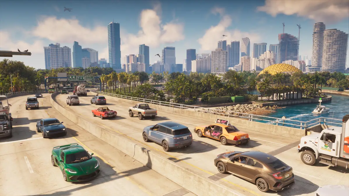 busy Vice City traffic on a highway below the downtown skyline in an official GTA 6 screenshot