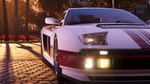 a white Grotti Cheetah sports car on a Vice City street at sunset in an official GTA 6 image