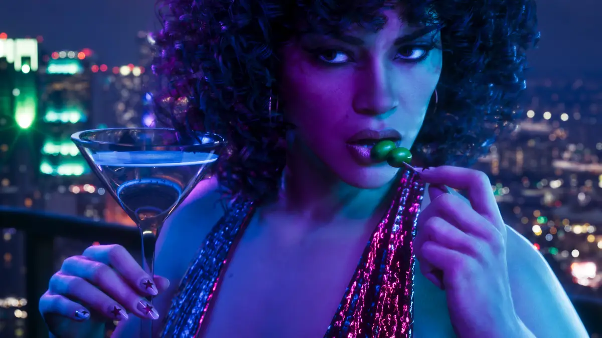 a woman with a cocktail against the Vice City skyline at night in a Rockstar Games image for GTA 6