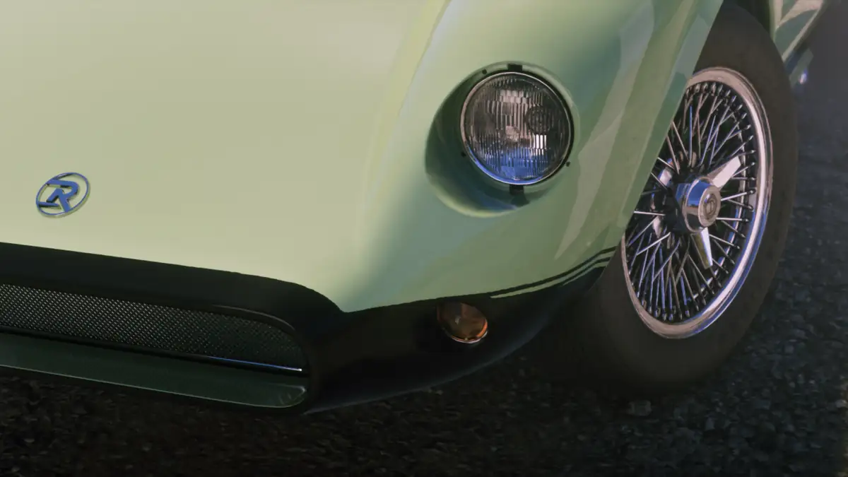 the pale green nose of a classic car with a round headlight and a chrome wire wheel in a Rockstar Games image for GTA 6