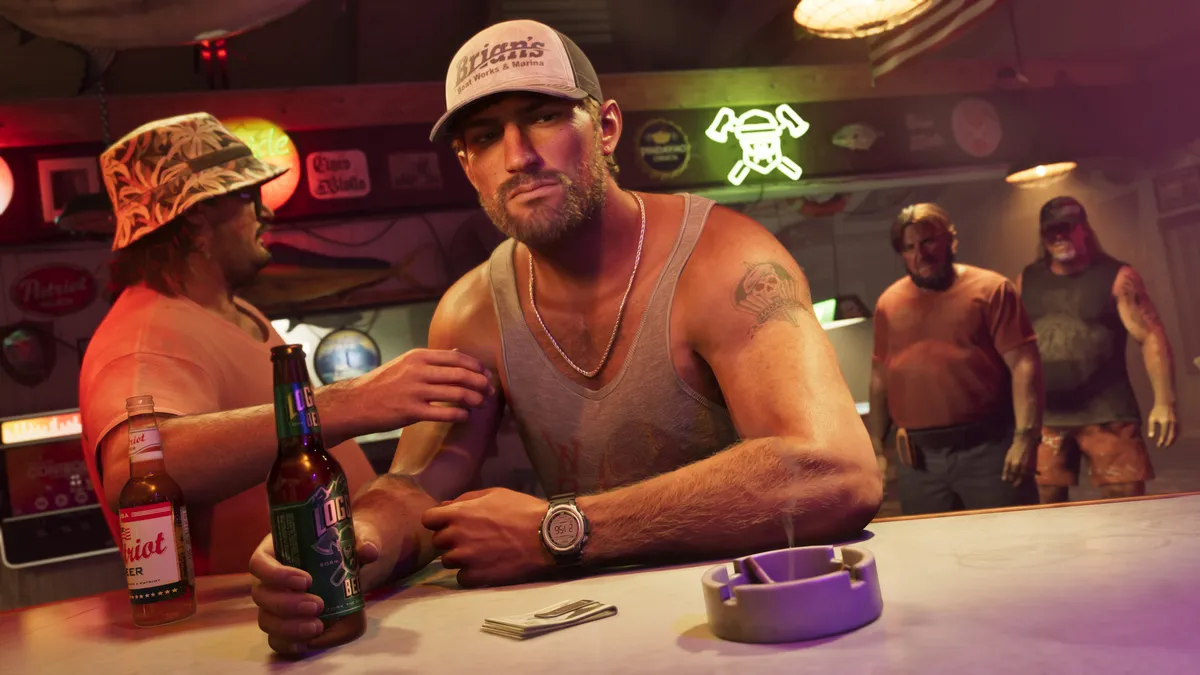 Jason in a trucker cap leaning on a bar beside a bottle of beer while men stand behind him in a Rockstar Games image for GTA 6