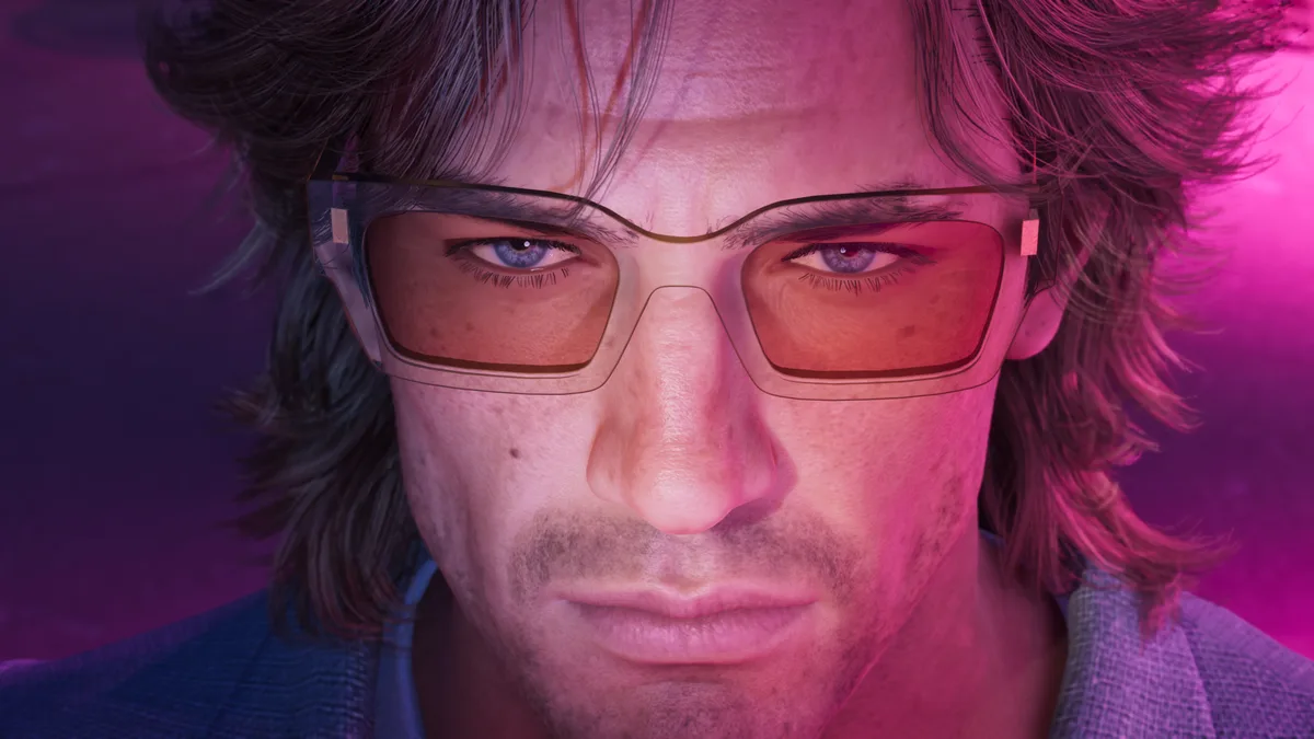 a man with long hair in tinted glasses lit by pink and purple light in a close Rockstar Games image for GTA 6